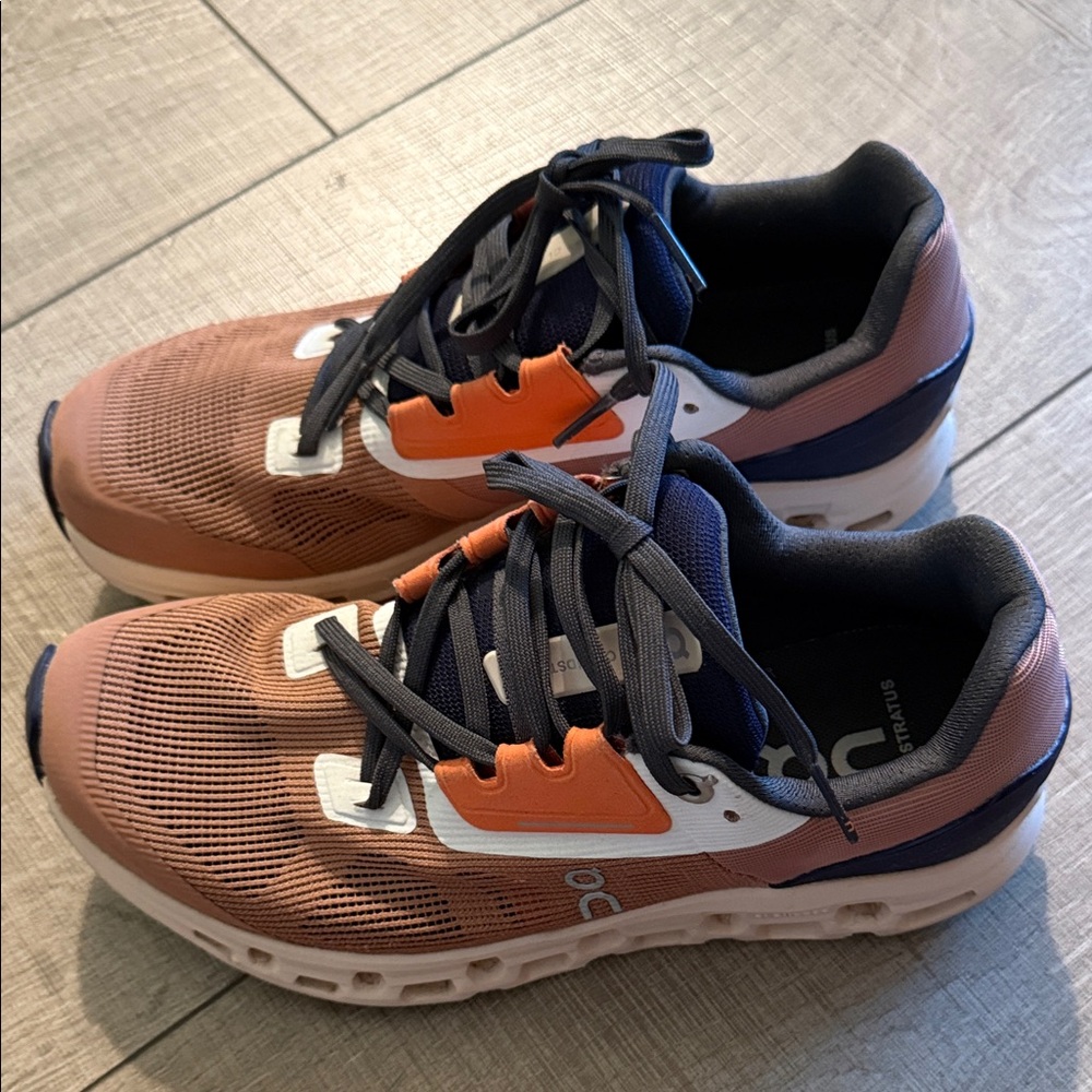 On Running Athletic Shoes in Orange and Navy